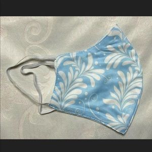 Light blue and white face mask